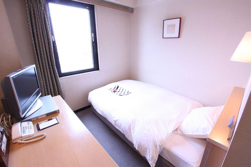 Apa Hotel Tonami Ekimae Екстер'єр фото